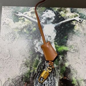 Louis Vuitton Gold Key and lock hand made leather not lvHolder
